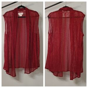 Red Vest with Open Front Design and Flowing Silhouette.